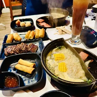 Half Pot Half Grill. Short Ribs, Veggie spring rolls, Chinese donuts.