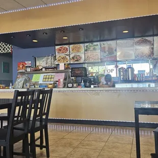 Spacious dining room with Chinese pop music playing