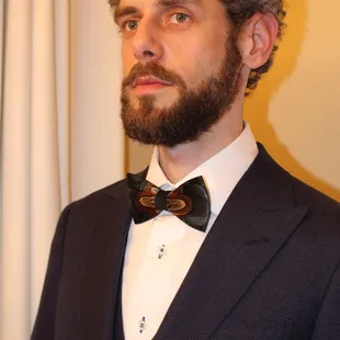 Alex B, wearing his wedding suit of Scabal mohair, Top Shelf shirt, and a pheasant feather tie