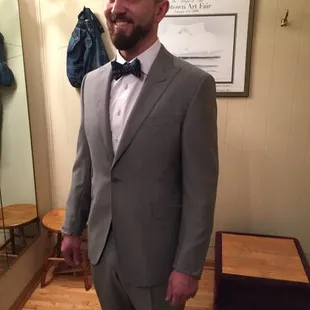 Brad G. getting ready for his wedding on Lake Minnetonka's Al and Alma charter wearing cool wool and mohair