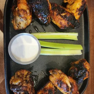 These grilled wings were delicious. Not sure how they were brined or marinaded, but they were flavorful and moist.