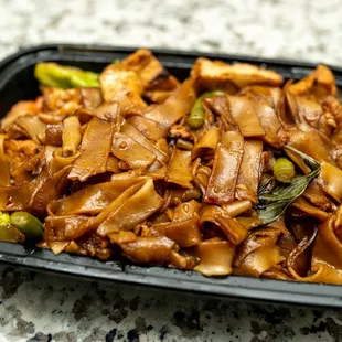 Spicy flat noodles with tofu