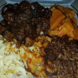 LARGE Oxtail Platter with Rice and Peas and Yams and Baked Mac n Cheese. YUMMY.