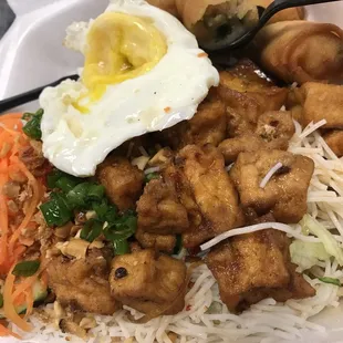 Tofu and fried egg vermicelli with veggie spring rolls -- decent but a bit dry approx $9.50 incl. taxes