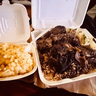 Large Succulent and Tender Jerk Chicken, Fluffy Rice and Red Beans, Festive Cabbage &amp; Side Order of Tasty Mac &amp; Cheese
