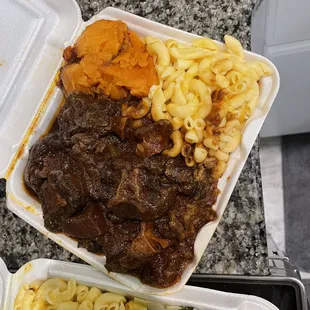Oxtail, Mac and Cheese, Sweet Potato , Rice and Beans