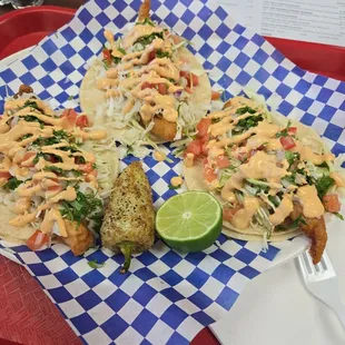 Fish tacos were fresh and veggies  where well cut has attention  to detail