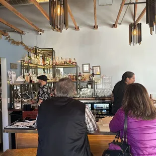 people sitting at a bar