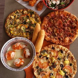 a variety of different types of pizza