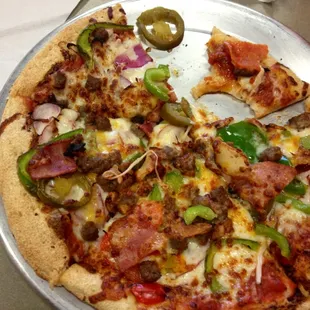 Supreme--my style---Peppers, pepperoni, Canadian bacon, hamburger, provolone, onions, mozzarella! DELISH! Nice airy crunch crust