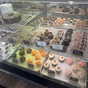 Cupcakes and tarts and cookies available