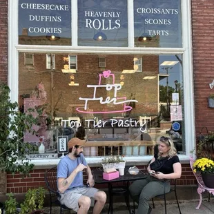 Outdoor seating in front of Top Tier Pastry in downtown Mantua, 4668 East Prospect