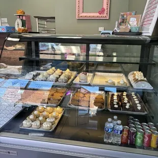 Refrigerated pastry items.  More pastry items on the left not shown in picture.