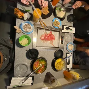 a group of people preparing food