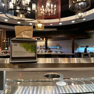 a hot pot on a conveyor belt