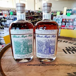 two bottles of black maple