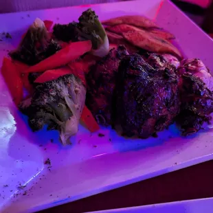 Jerk chicken with steamed veggies.