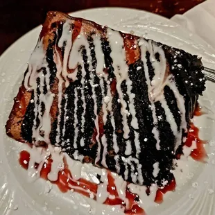 Chocolate Mousse cake w/raspberry drizzle