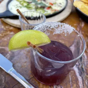 Sickening sweet Marionberry margarita. The gelatinous queso dip in the background.