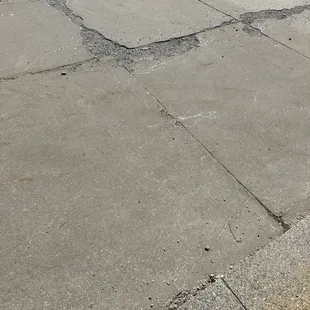 More examples of the awful sidewalk outside.