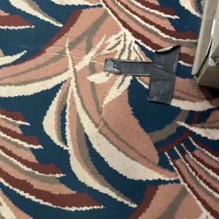 Duct tape on filthy carpet.
