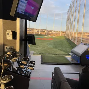 a view of a golf course from the driver&apos;s seat