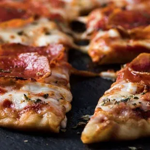 a slice of pepperoni pizza