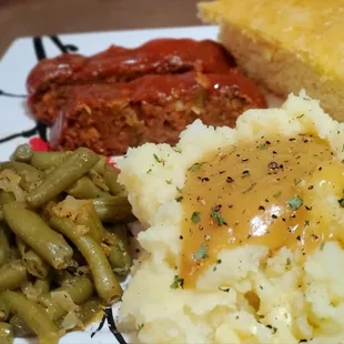 Meatloaf ,green beans,mashed potatoes and gravy sweet corn bread
