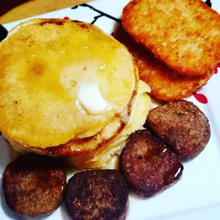 Pancakes, sausage ,hashbrowns