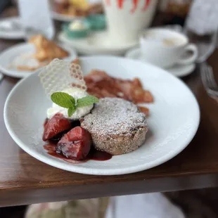 The bread pudding breakfast is nice. It&apos;s very sweet, and the berries are in a sauce, they are warm, with a fresh whipped cream.