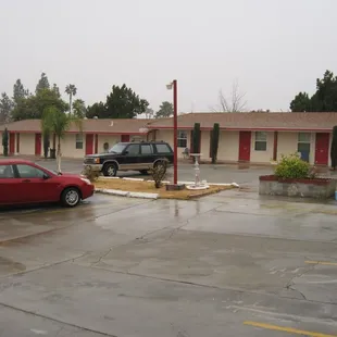 Parking lot, exterior of motel
