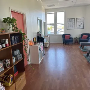 a living room with wood floors