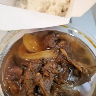 Bistek tagalog rice plate (packaged for takeout)