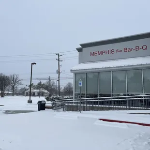 ows a car parked in the snow
