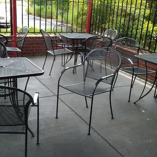 ows tables and chairs on a patio