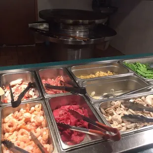 Raw ingredients and Mongolian Grill