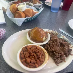 Roast beef, mashed potatoes, and red beans