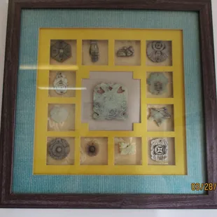 Top&apos;s China, New Kent: Folk artwork on the wall. Cloisonné, I think.