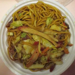 a plate of noodles and vegetables