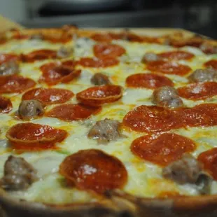 Our homemade pizza, the famous TOPS special.