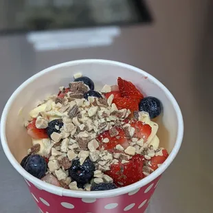 a bowl of fruit and granola