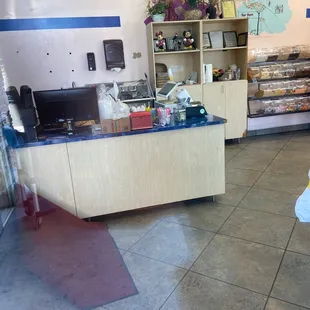 Empty counter as a family who isn&apos;t seen is almost ready to pay