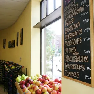 a display of apples and oranges