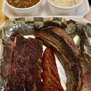 3 meats: pork ribs, sausage, brisket.  Low and slow to perfection.