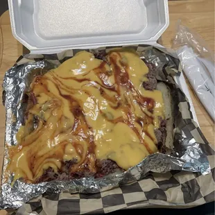 There's a potato under that delicious cheese and bbq. We didn't get the jalepeños, they'd be in the mix too.  YUM.