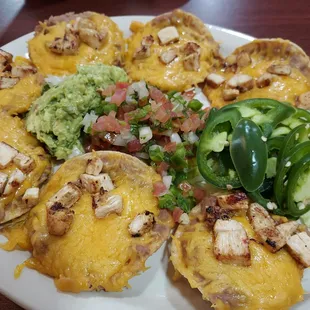 Chicken nachos with guacamole, Pico and Japanese. Pretty darn good!  Guacamole fresh as always but japs had no heat.