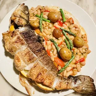 a plate of fish and beans