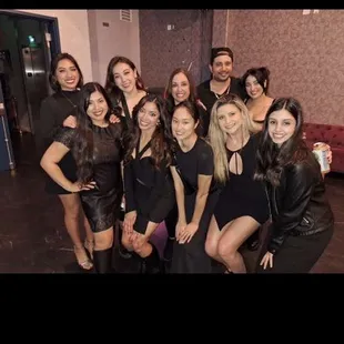 a group of people posing for a picture