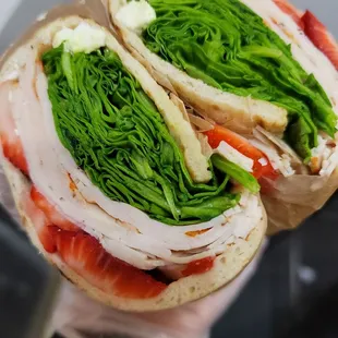 a turkey, lettuce, and tomato sandwich