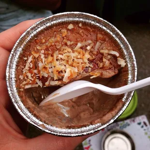 The coconut atop the chocolate. I would've preferred the caramel the way intended, but they ran out.